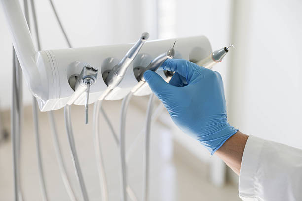 Professional Tooth Extraction technician working in Mocksville, NC